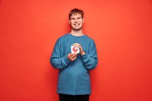 Special needs boy holding Time Timer