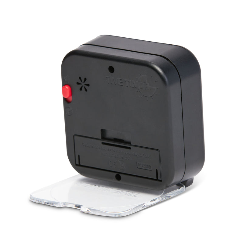 Time Timer Original 3 inch Visual Timer - Pocket. Back of product. Alert is optional and can be set with the red on/off sound switch. Requires singe AA battery. The cover flips around and acts as stand