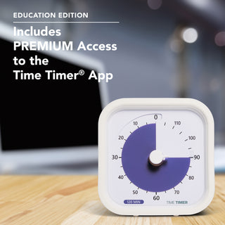 The Time Timer MOD 120-minute visual timer is shown on a work desk with a laptop in the background. The bold purple disk is set to 90 minutes to imply a 90 minute focused work session.