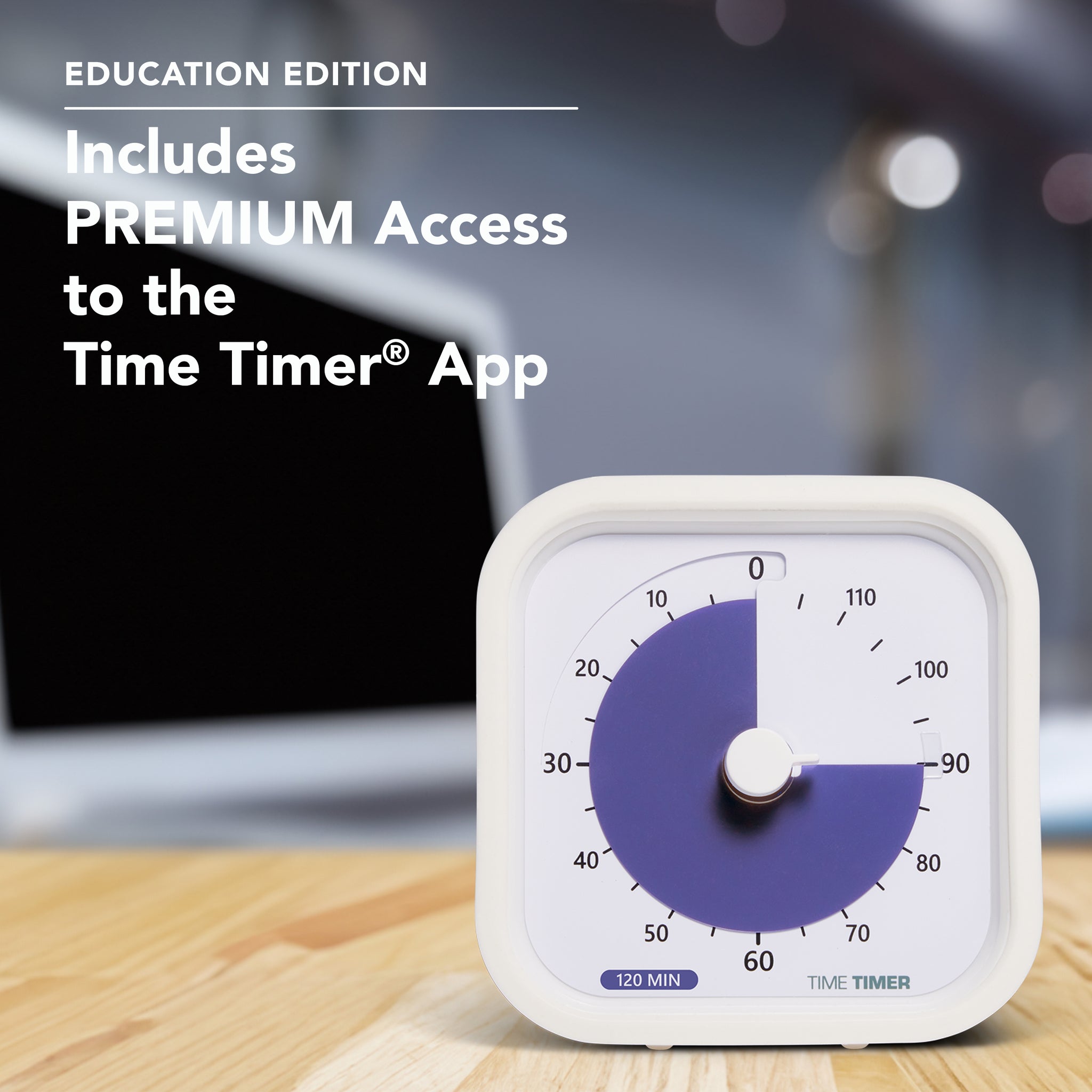The Time Timer MOD 120-minute visual timer is shown on a work desk with a laptop in the background. The bold purple disk is set to 90 minutes to imply a 90 minute focused work session.