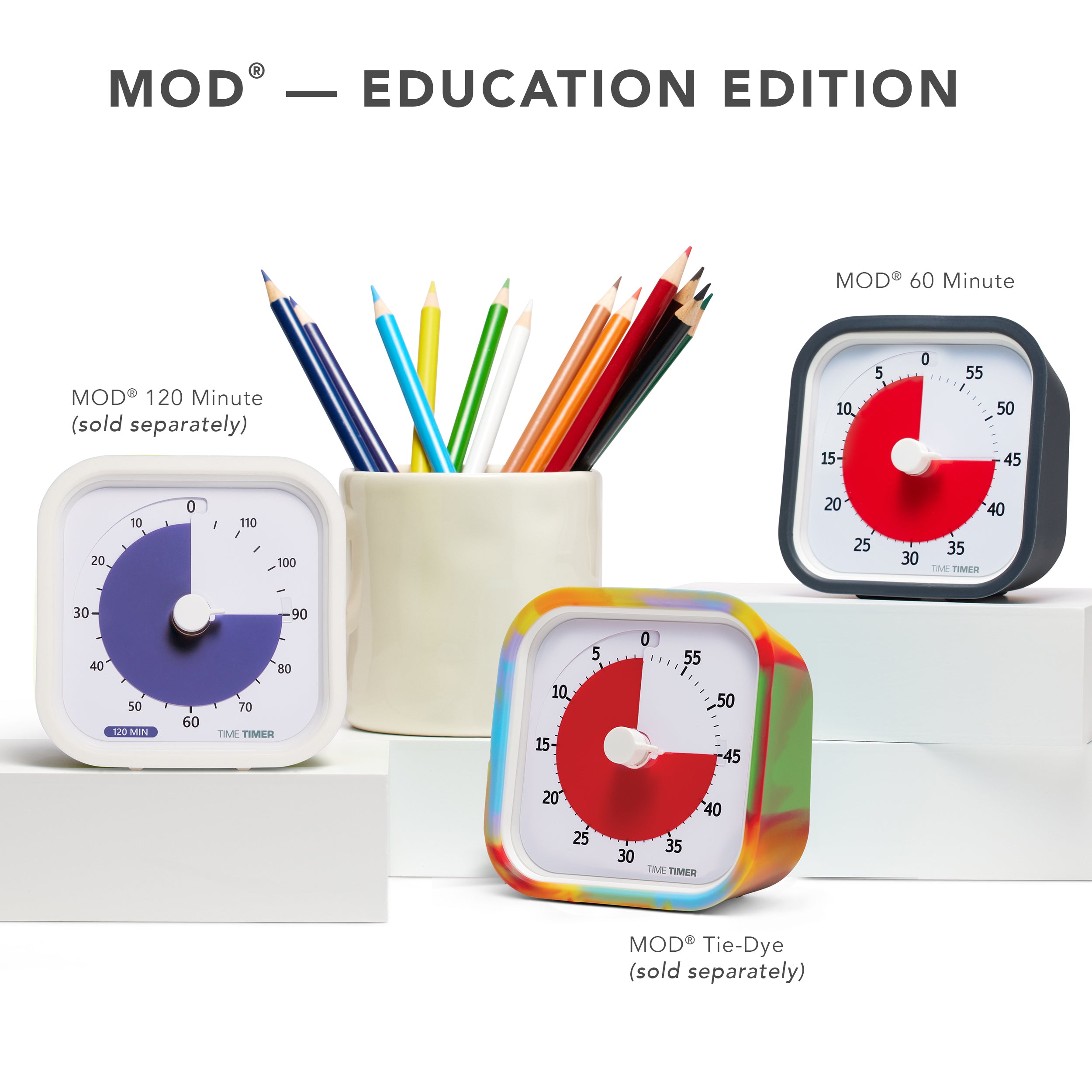 Three Time Timer MOD visual timers are shown together. The headline on the photo reads " MOD - Education Edition." The first timer shown is the MOD 120 Minute (sold separately). The second timer shown is the Time Timer MOD Tie-Dye Edition (sold separately) and the last time shown is the Time Timer MOD 60 Minute Visual timer with a charcoal case.