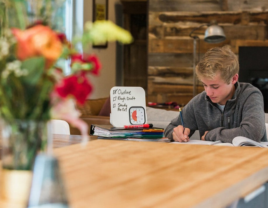 A Teenager Using Time Timer To Study
