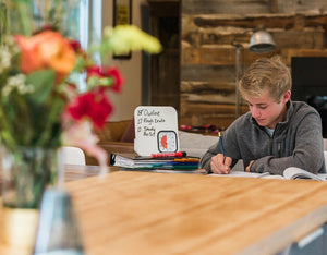 A Teenager Using Time Timer To Study